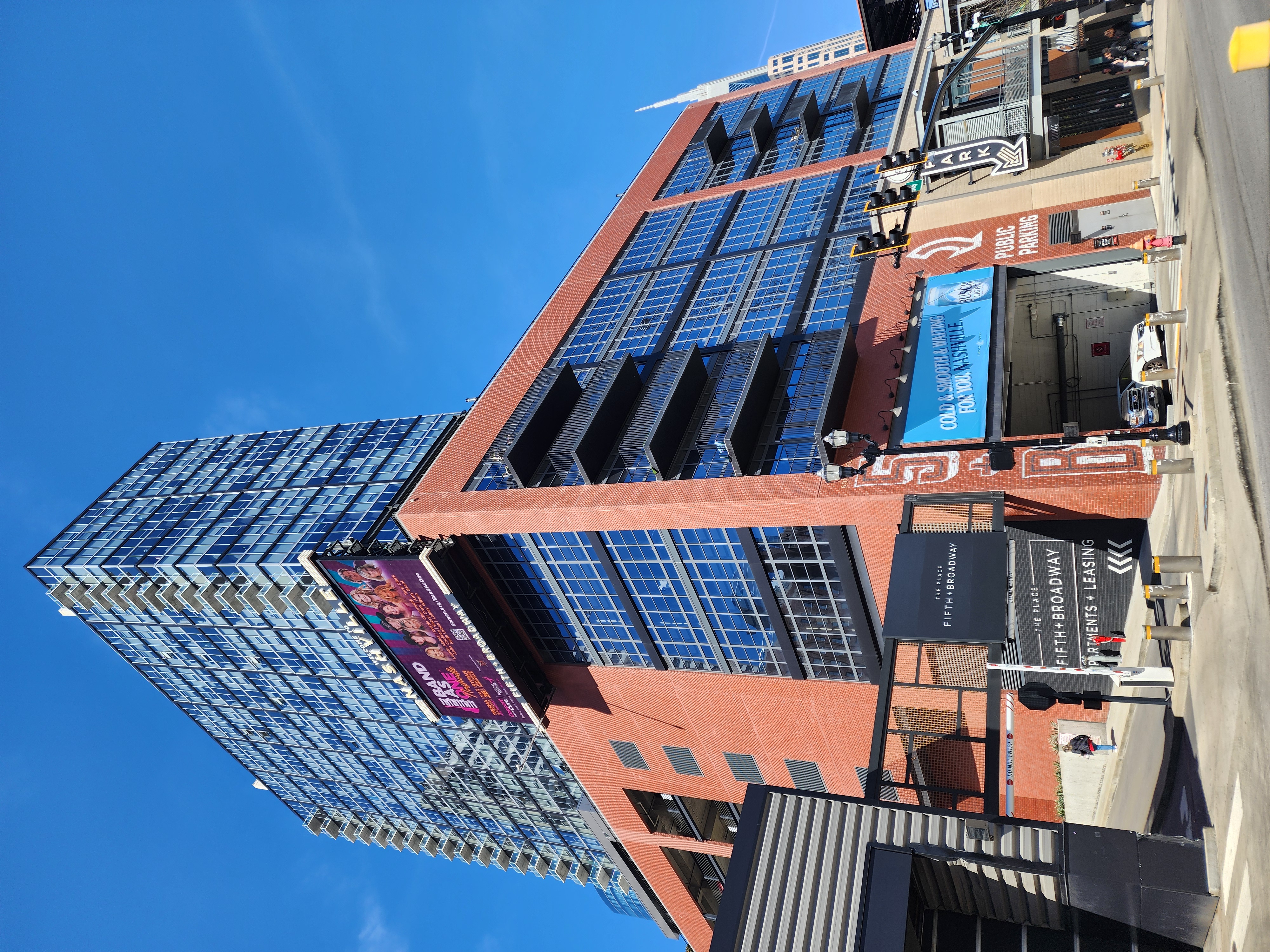 The Fifth + Broadway development viewed from street level.