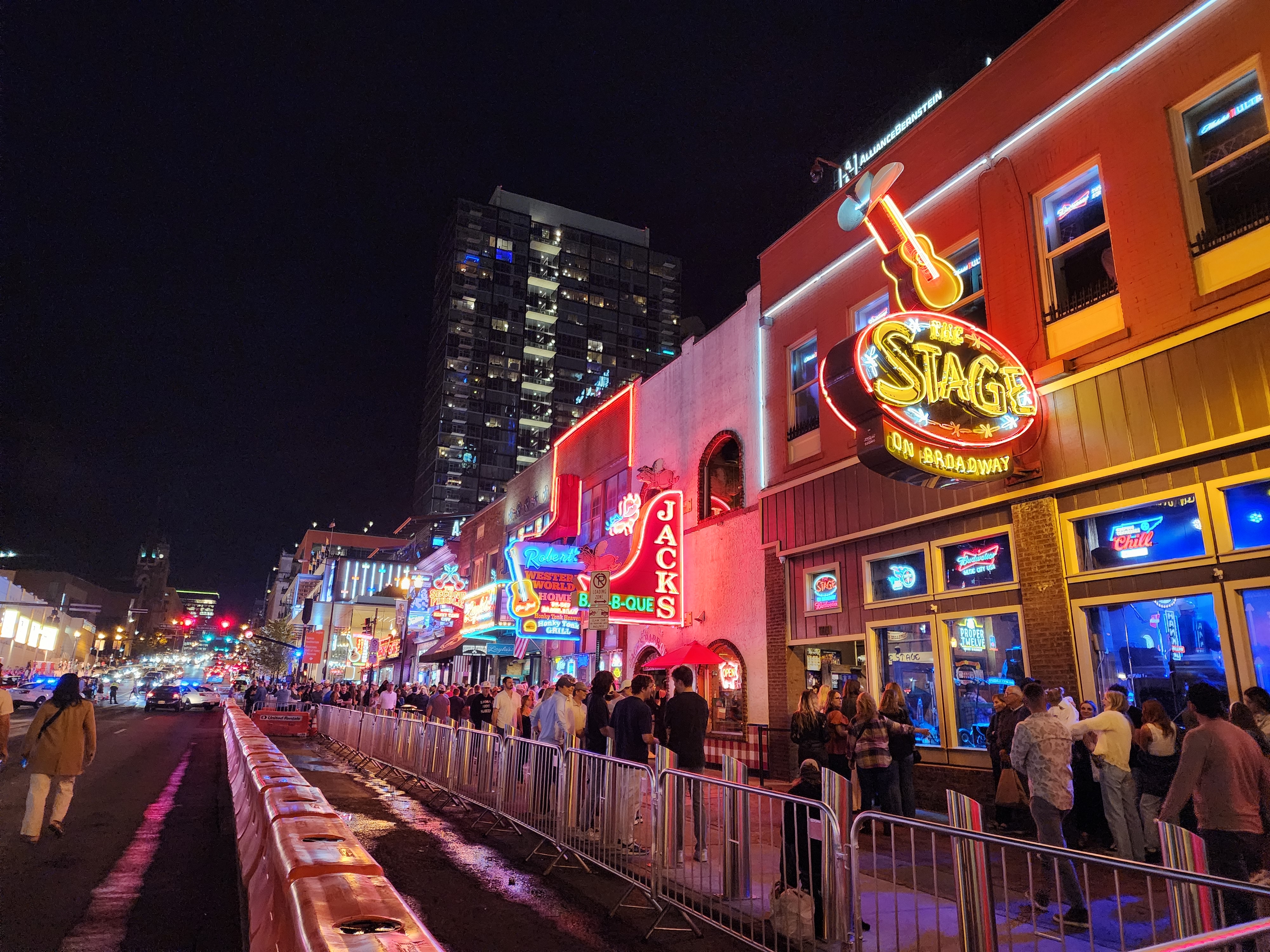The Stage and neighboring Lower Broadway venues illuminated at night.
