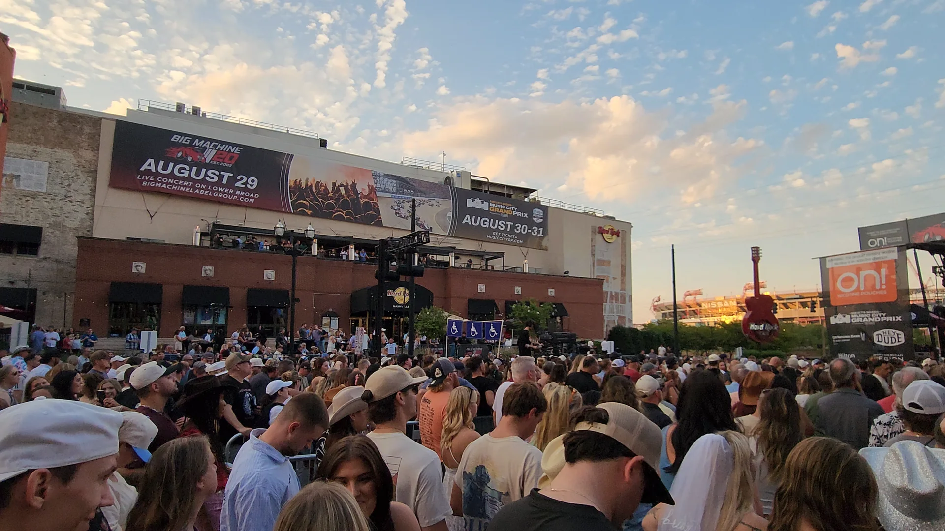 A large crowd gathered downtown near Lower Broadway during an event.